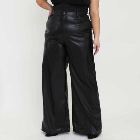 Plus Size Dark Wash High Rise Flared Jeans from Vibrant MIU